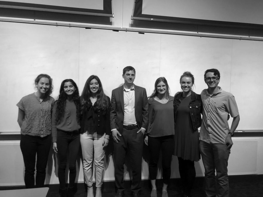 Dr. Daniel Cox, a fellow of the American Enterprise Institute, with the student members of the AEI Executive Council after the lecture.