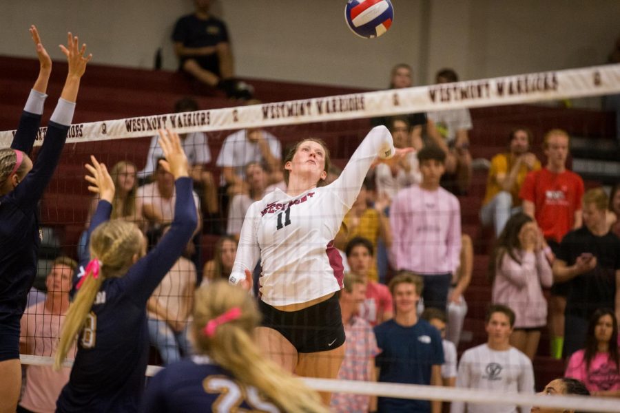 Senior Cassidy Rea approaches a hit during a home volleyball game.