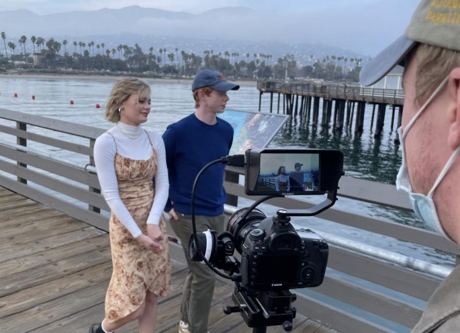 Junior Emi Brewer and Sophomore Landon Moir on set