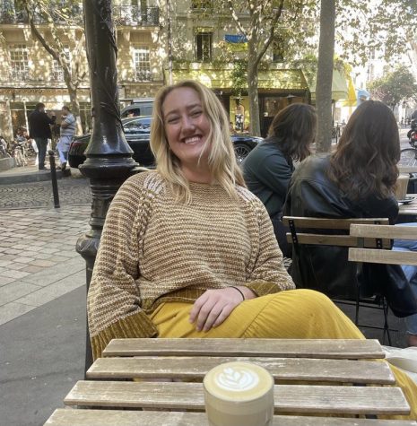Kat Smith at a café in Paris