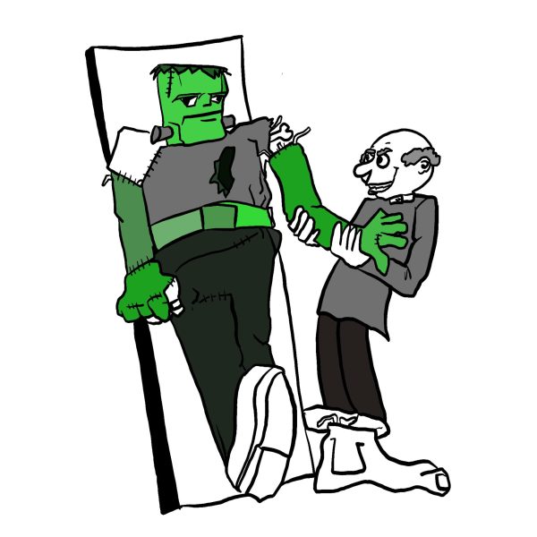 An Engineering professor helps a green Frankenstein monster stand up.