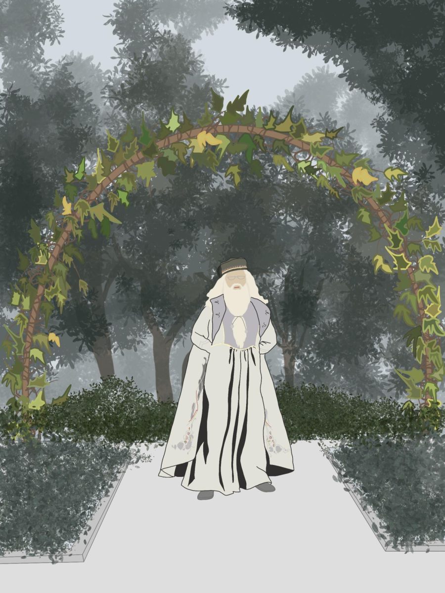 Dumbledore stands in Westmonts formal gardens.