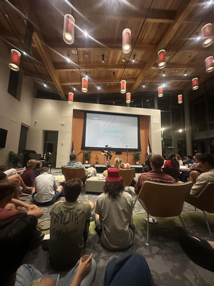 Students gather in front of the stage for the Phoenix Open Mic Night.