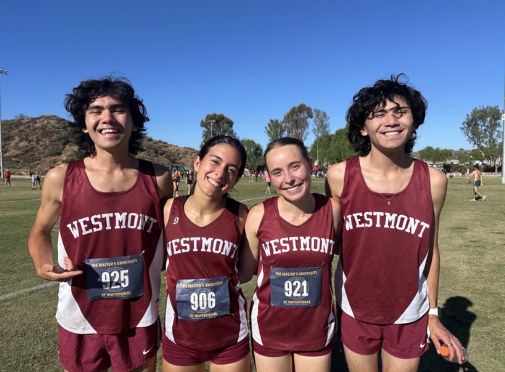 Maverick Adam, Sophia Hernandez, Sophie Stoddart, and Apollo Adam share post-race smiles.